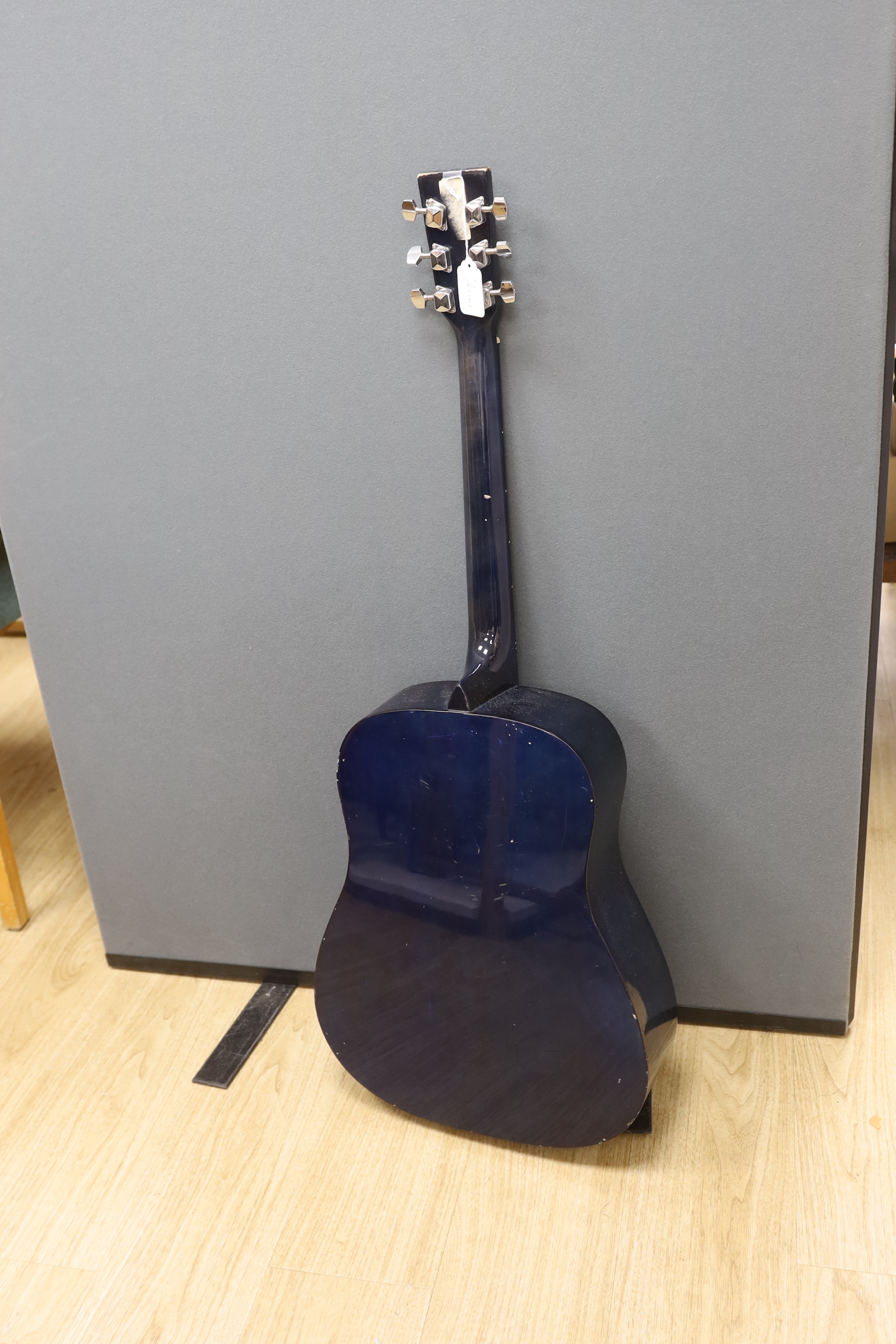 A Martin Smith electro-acoustic guitar in a Ritter soft case
